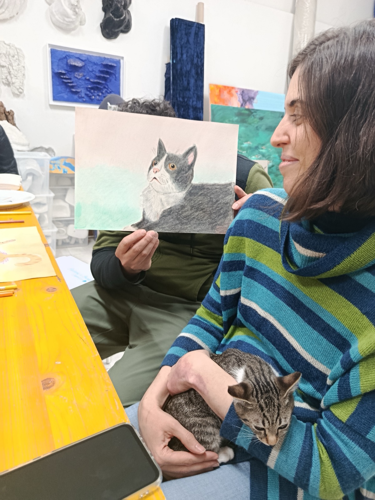 Detail of a cat portrait shown during a workshop
